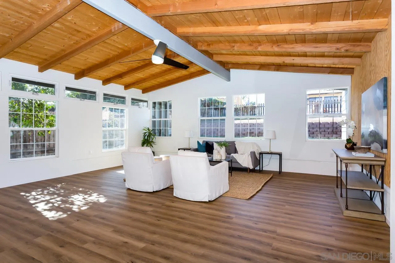 2610 Glebe Road Lemon Grove, CA 91945 - Photo 17 of 31 a living room with furniture and wooden floor