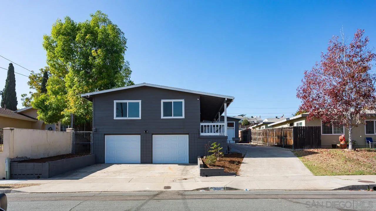 2610 Glebe Road Lemon Grove, CA 91945 - Photo 21 of 31 a front view of a house with a yard