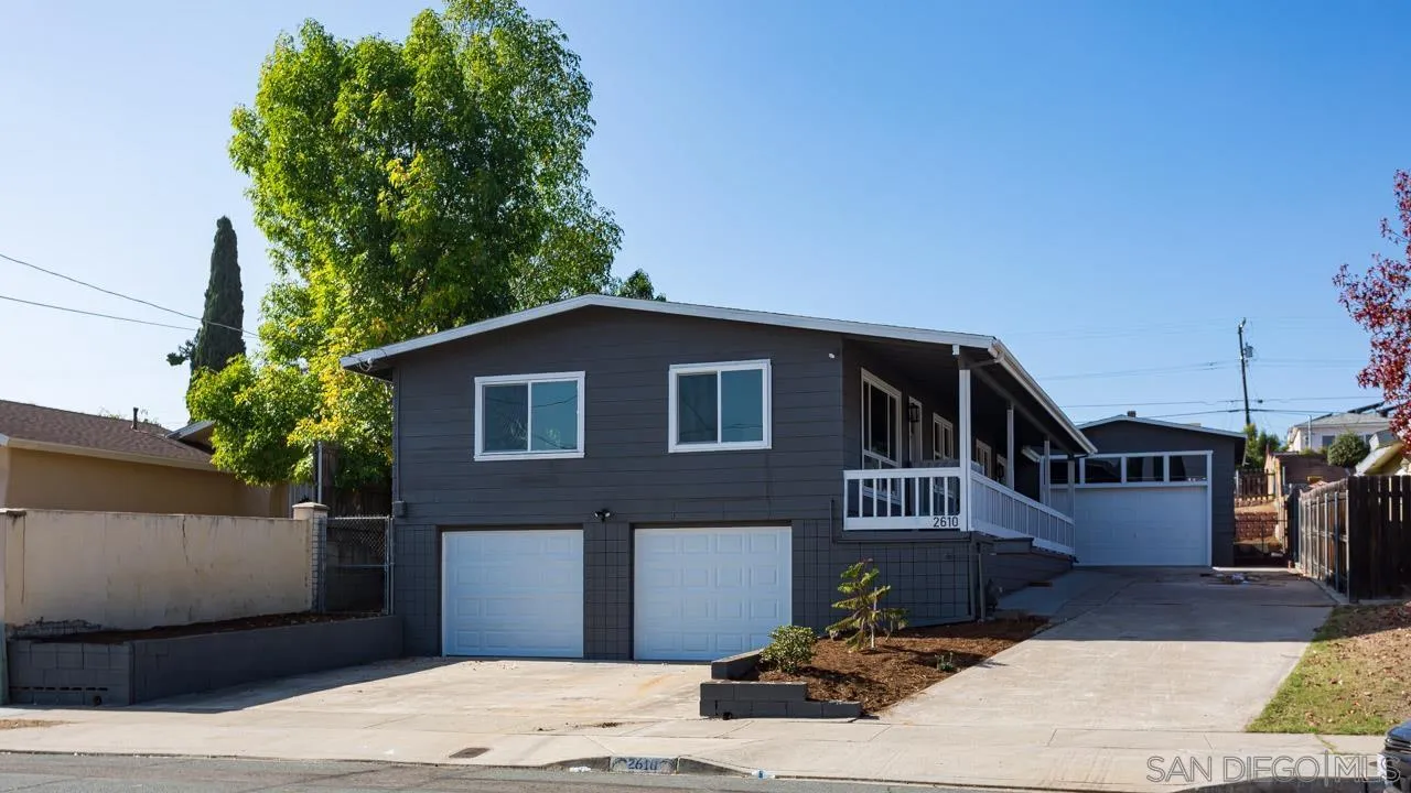 2610 Glebe Road Lemon Grove, CA 91945 - Photo 22 of 31 a view of a house with a yard