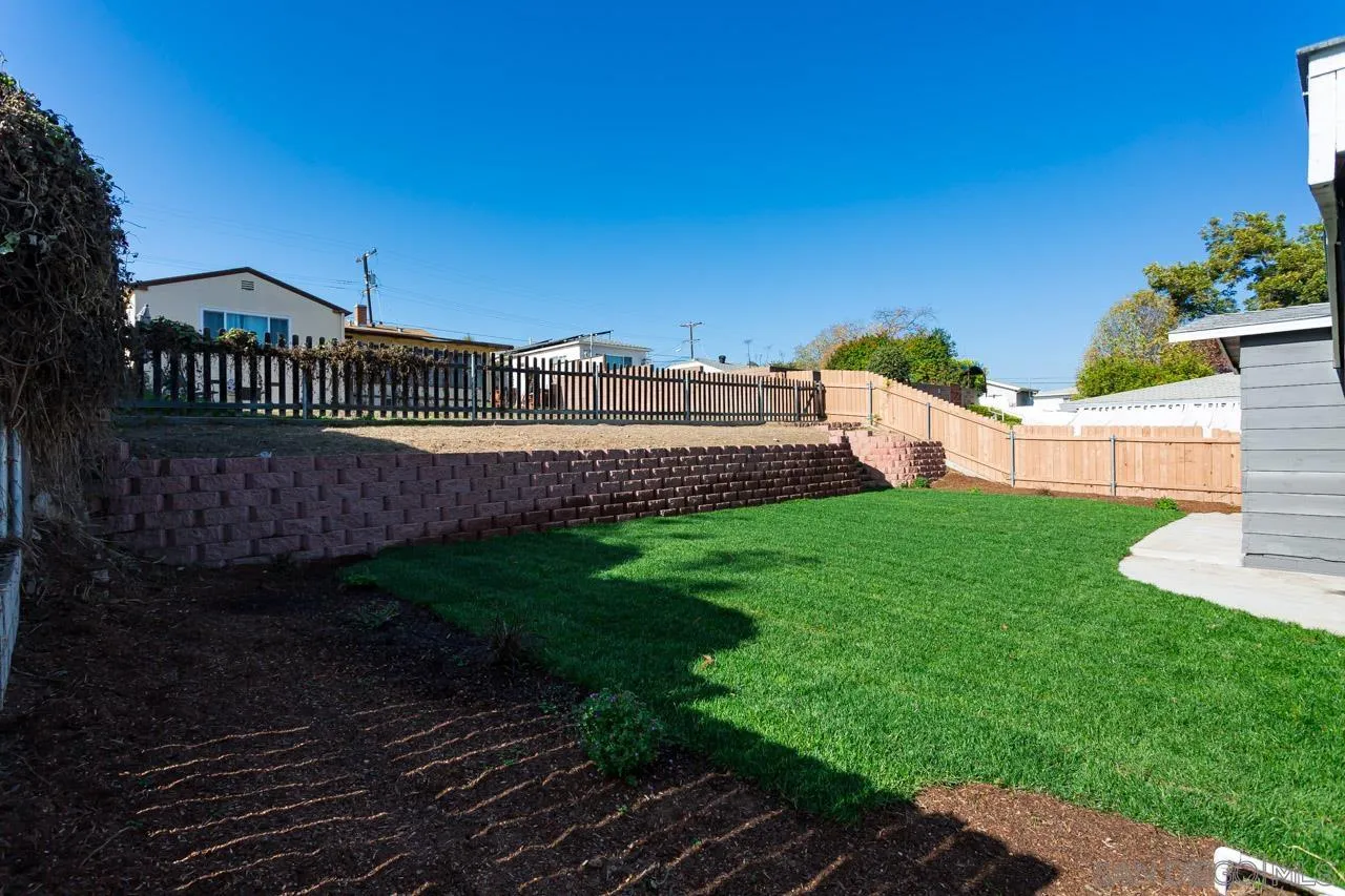 2610 Glebe Road Lemon Grove, CA 91945 - Photo 23 of 31 a view of a house with a yard