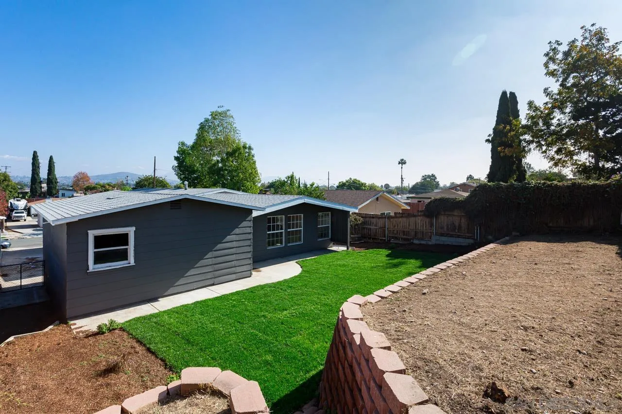 2610 Glebe Road Lemon Grove, CA 91945 - Photo 27 of 31 a view of a house with a backyard
