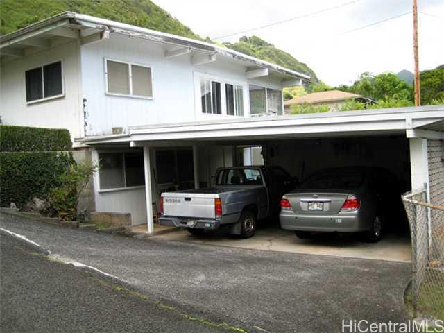 2873 Manoa Road Honolulu, HI 96822 - Photo 1 of 1 a car parked in front of a house