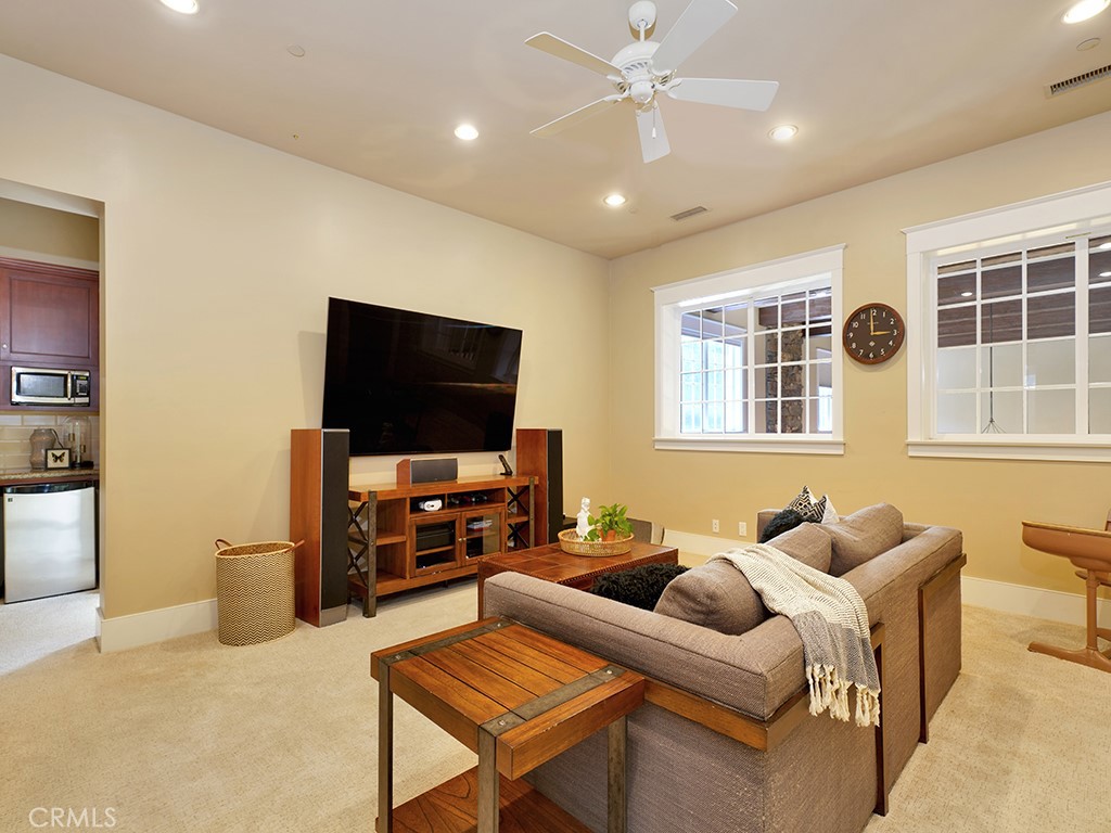 28291 Williams Canyon Road Silverado, CA 92676 - Photo 38 of 74 a living room with furniture and a flat screen tv