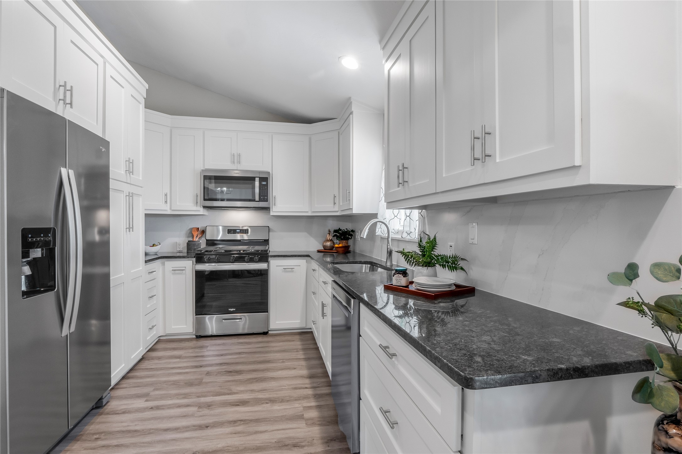 8007 Colony Loop Drive Austin, TX 78724 - Photo 11 of 40 Updated kitchen with granite countertops, stainless steel appliances, and abundant cabinetry designed for everyday living.