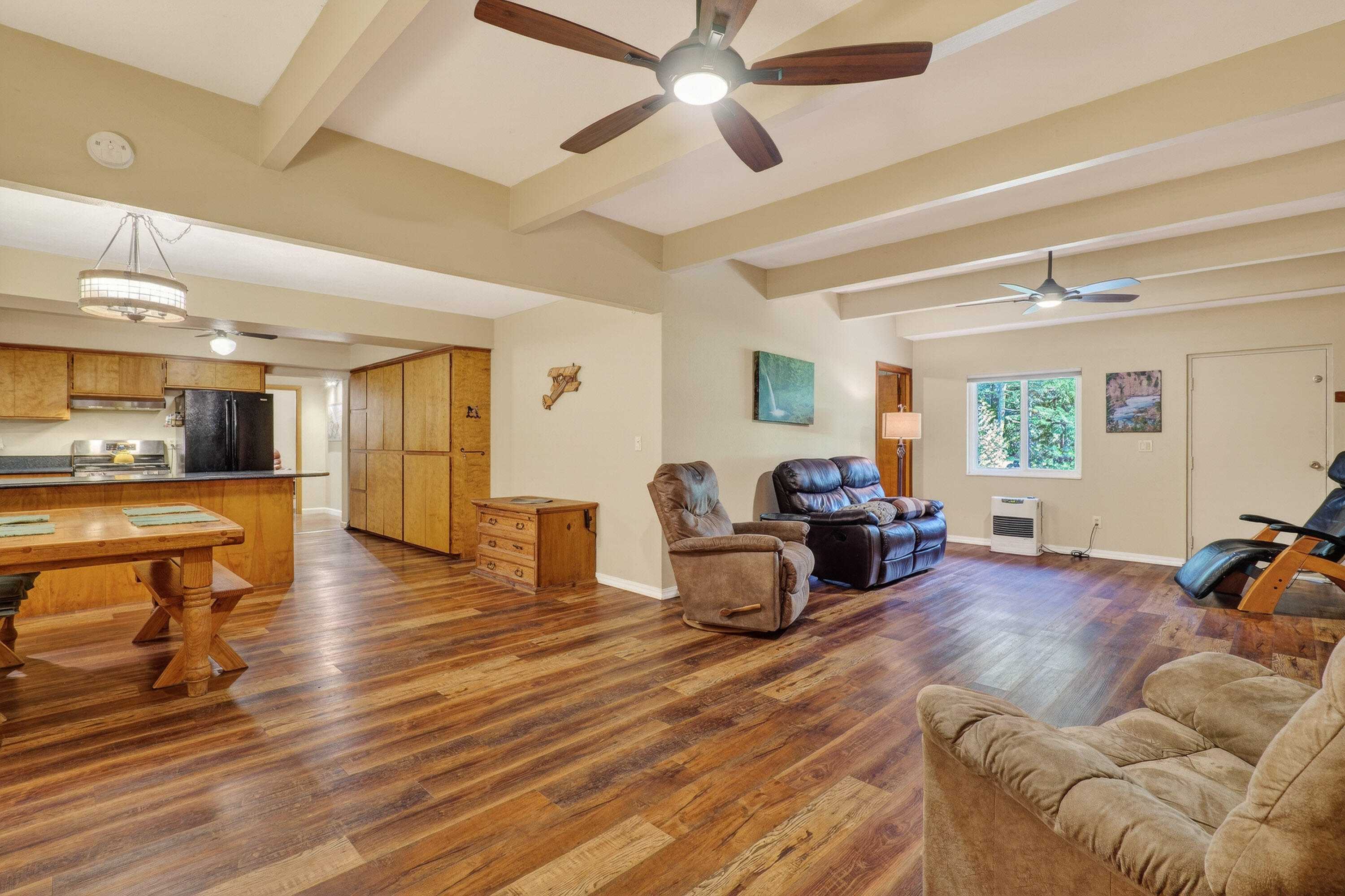 244 Riessen Road Grants Pass, OR 97526 - Photo 8 of 52 a living room with furniture and a wooden floor