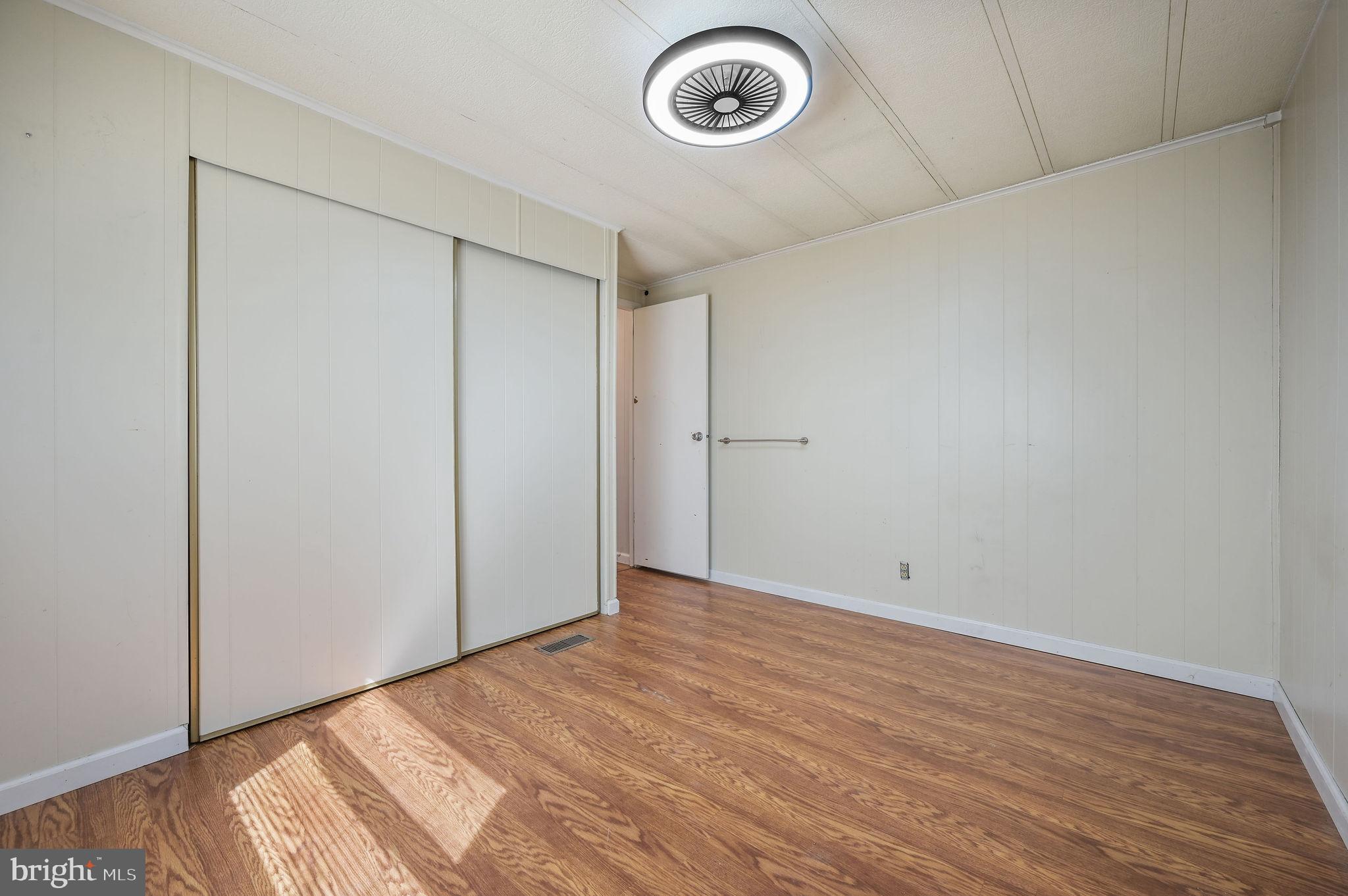 3 Patterson Drive Georgetown, DE 19947 - Photo 23 of 25 a view of a room with wooden floor