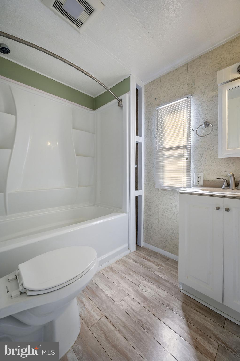 3 Patterson Drive Georgetown, DE 19947 - Photo 25 of 25 a bathroom with a toilet a sink and bathtub
