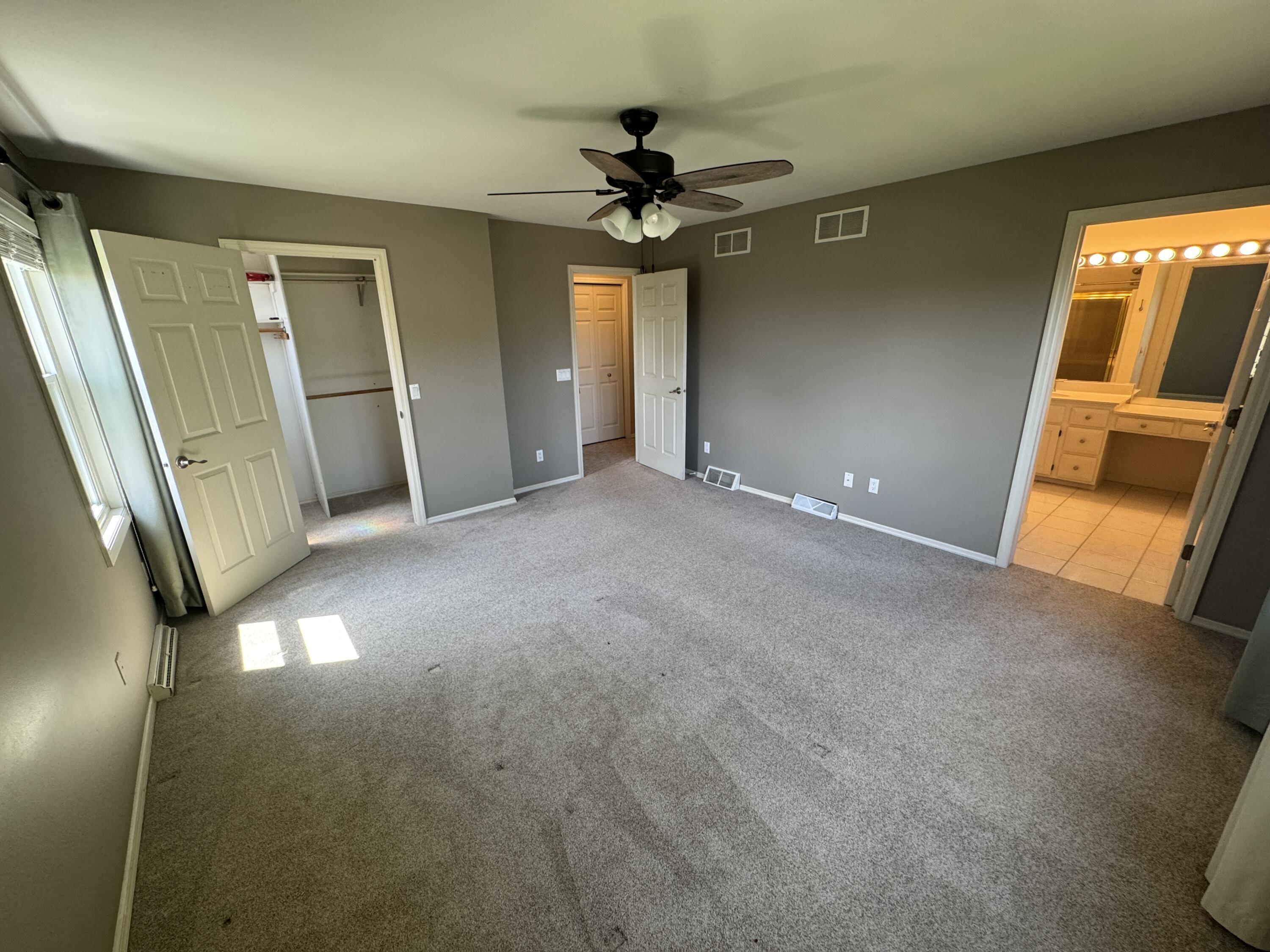829 Foxfield Rd. Oregon, WI 53575 - Photo 17 of 27 Upstairs primary bedroom with attached bath