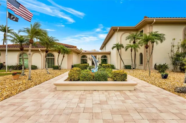 a view of building with outdoor space and seating