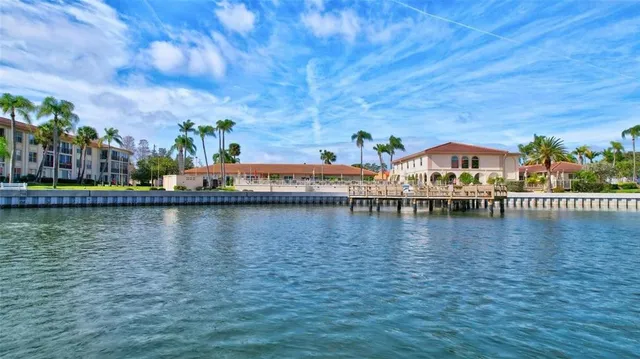 a view of swimming pool with a lake view