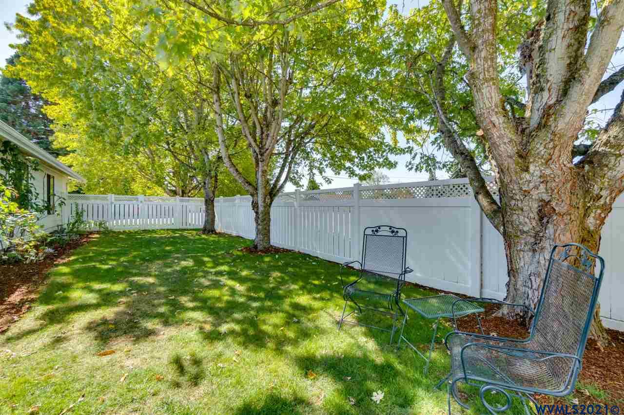 4695 Herrin Road Northeast Salem, OR 97305 - Photo 3 of 32 a backyard of a house with lots of green space