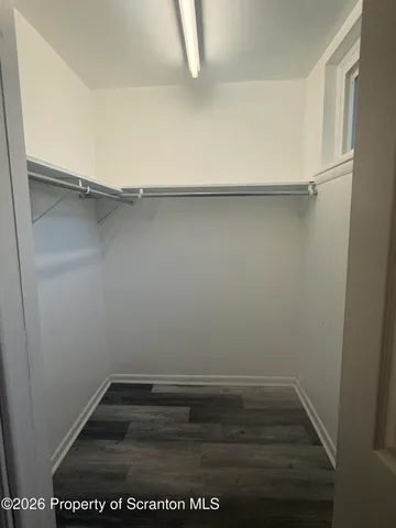 a view of an empty walk in closet