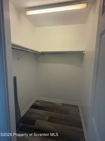 a view of small space with racks on the wall