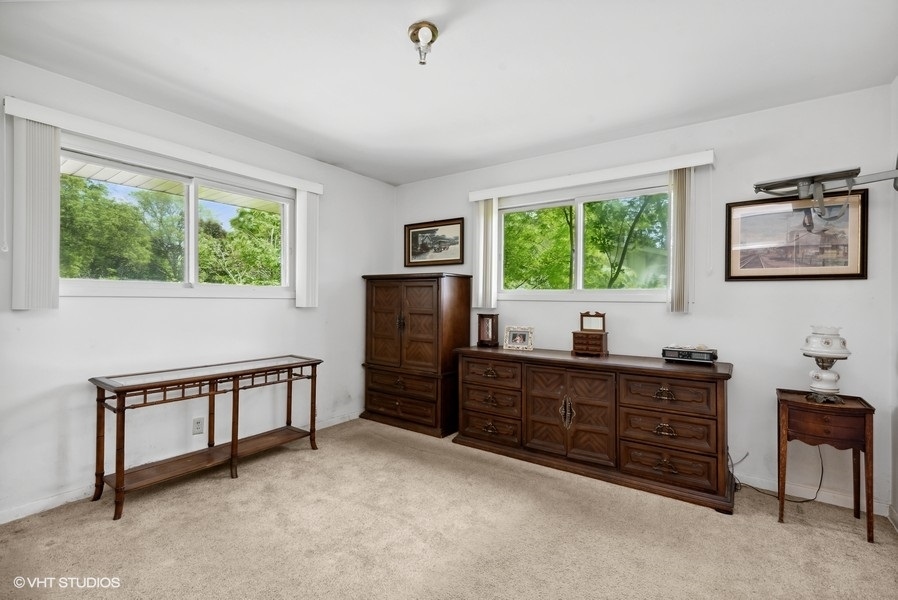 642 Deerpath Road East Dundee, IL 60118 - Photo 8 of 13 a living room with furniture and a window