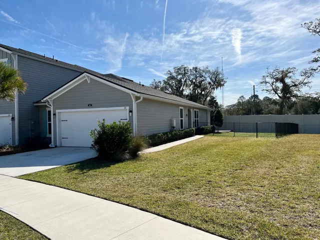 a house view with a garden space