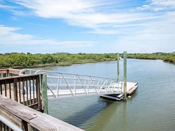 a view of deck with lake and mountain view