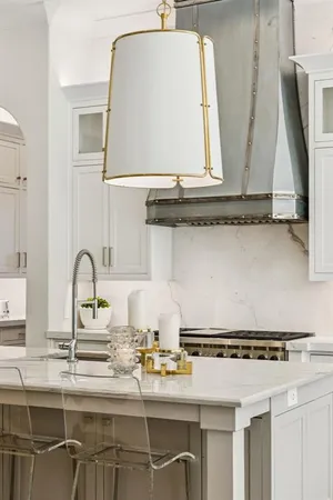a kitchen with a sink and a stove