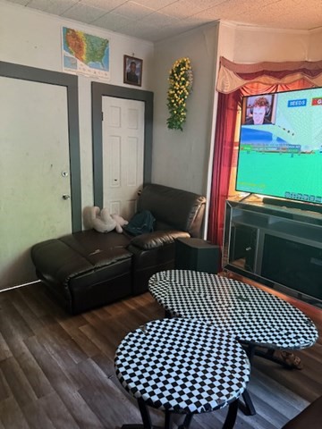 63 Oak Street Springfield, MA 01109 - Photo 4 of 5 a bedroom with a bed and wooden floor