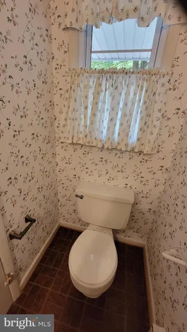 a room with furniture and window