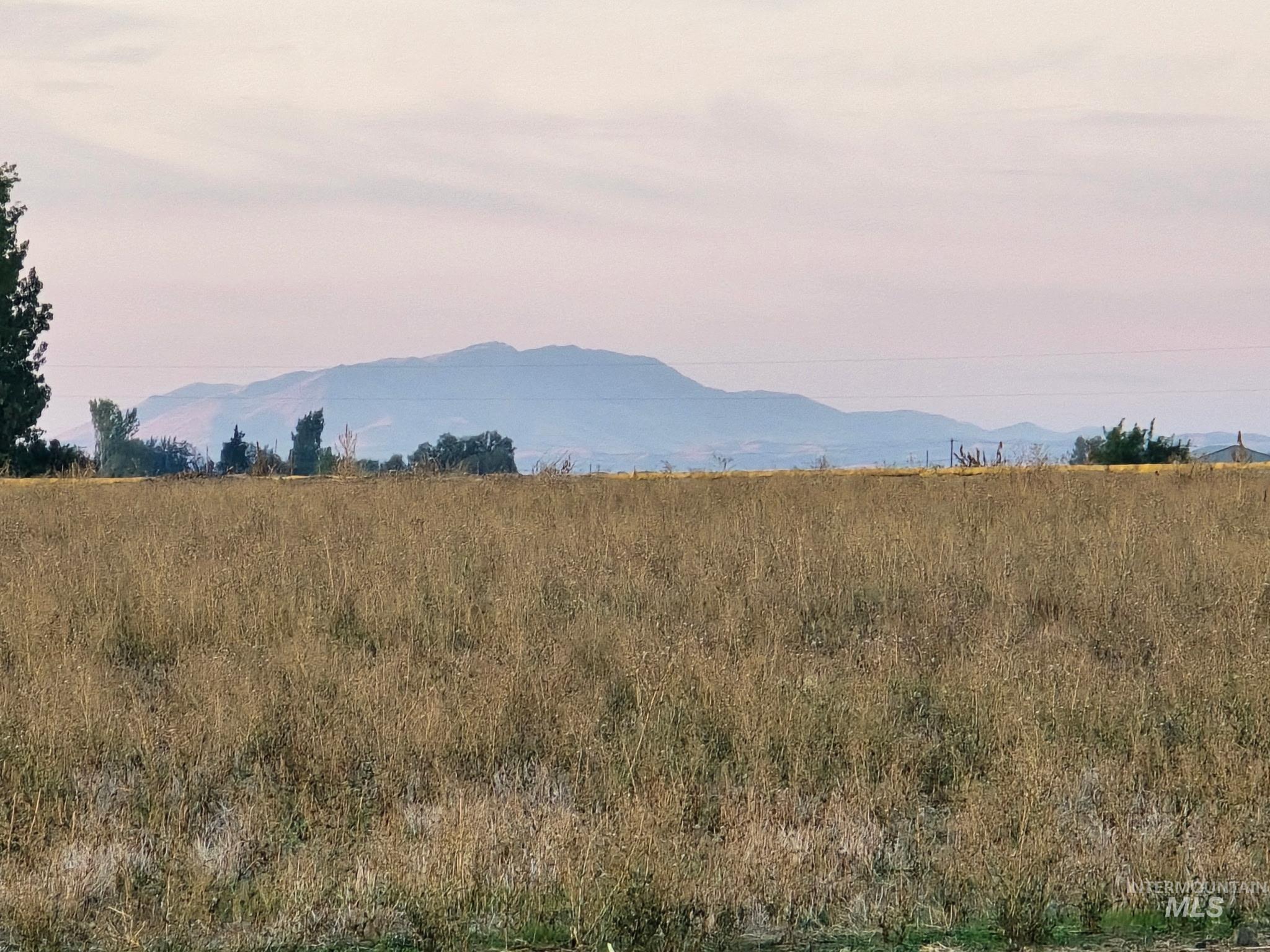 4276 West Mockingjay Kuna, ID 83634 - Photo 14 of 35 View of mountain backdrop with rural landscape