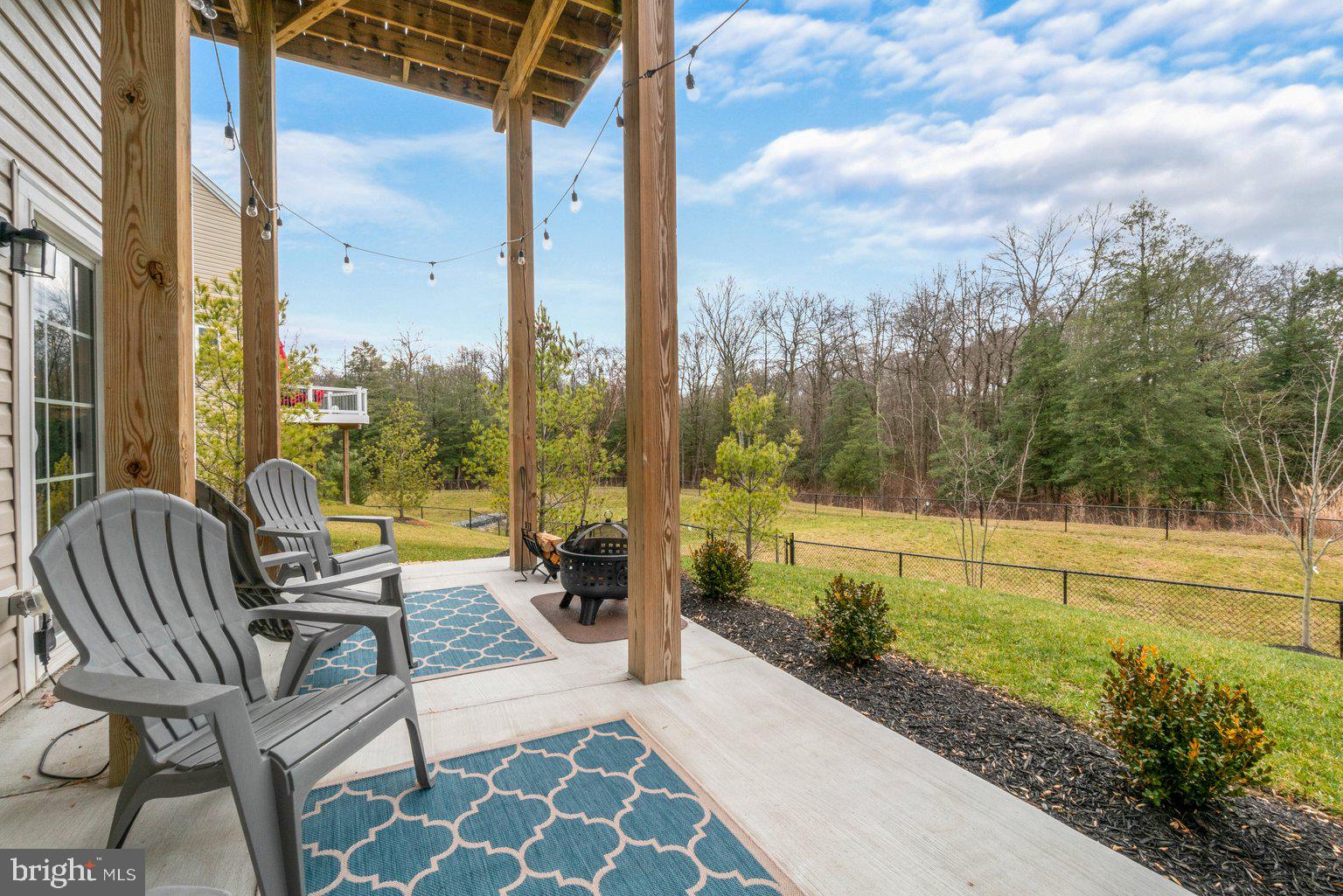 930 Ramble Run Road Baltimore, MD 21220 - Photo 44 of 54 Covered Rear Patio With Landscaping
