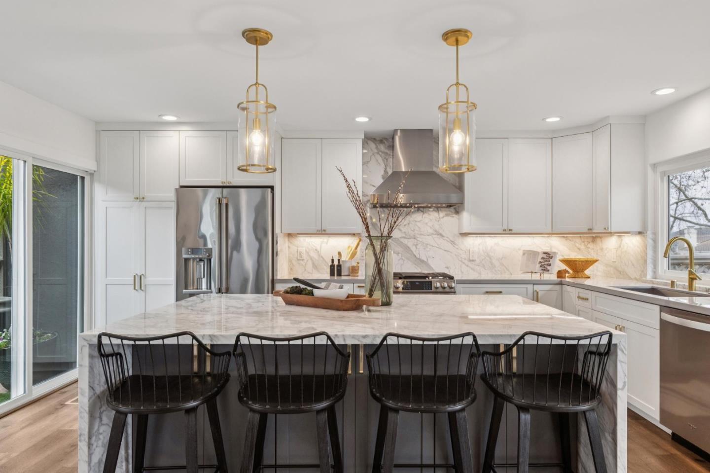 1962 Rancho Verde Circle West Danville, CA 94526 - Photo 23 of 60 a kitchen with a dining table chairs and refrigerator
