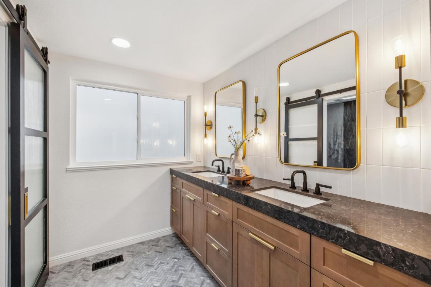 1962 Rancho Verde Circle West Danville, CA 94526 - Photo 38 of 60 a bathroom with double sink and a mirror
