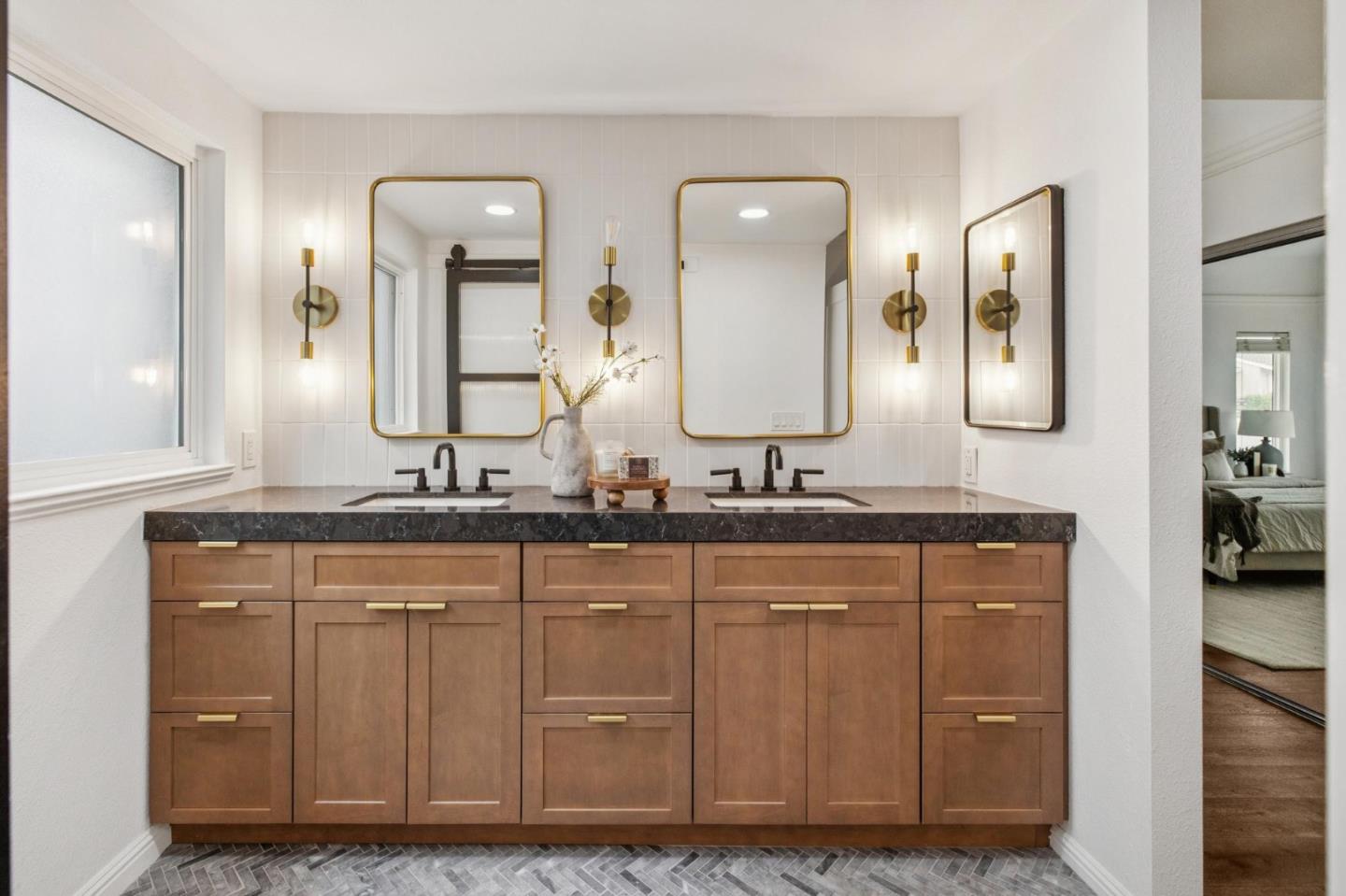 1962 Rancho Verde Circle West Danville, CA 94526 - Photo 39 of 60 a bathroom with a granite countertop double vanity sinks and a mirror