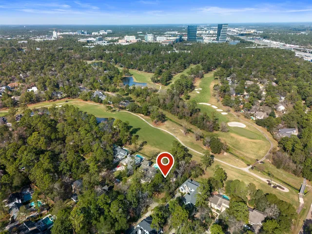 a view of house with a yard
