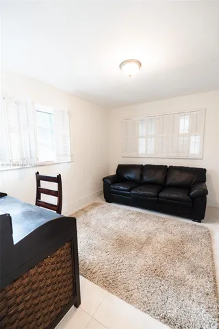 a kitchen with a sink and a stove