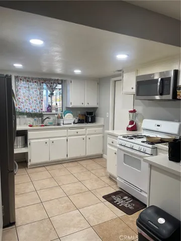 a view of a hallway with a furniture