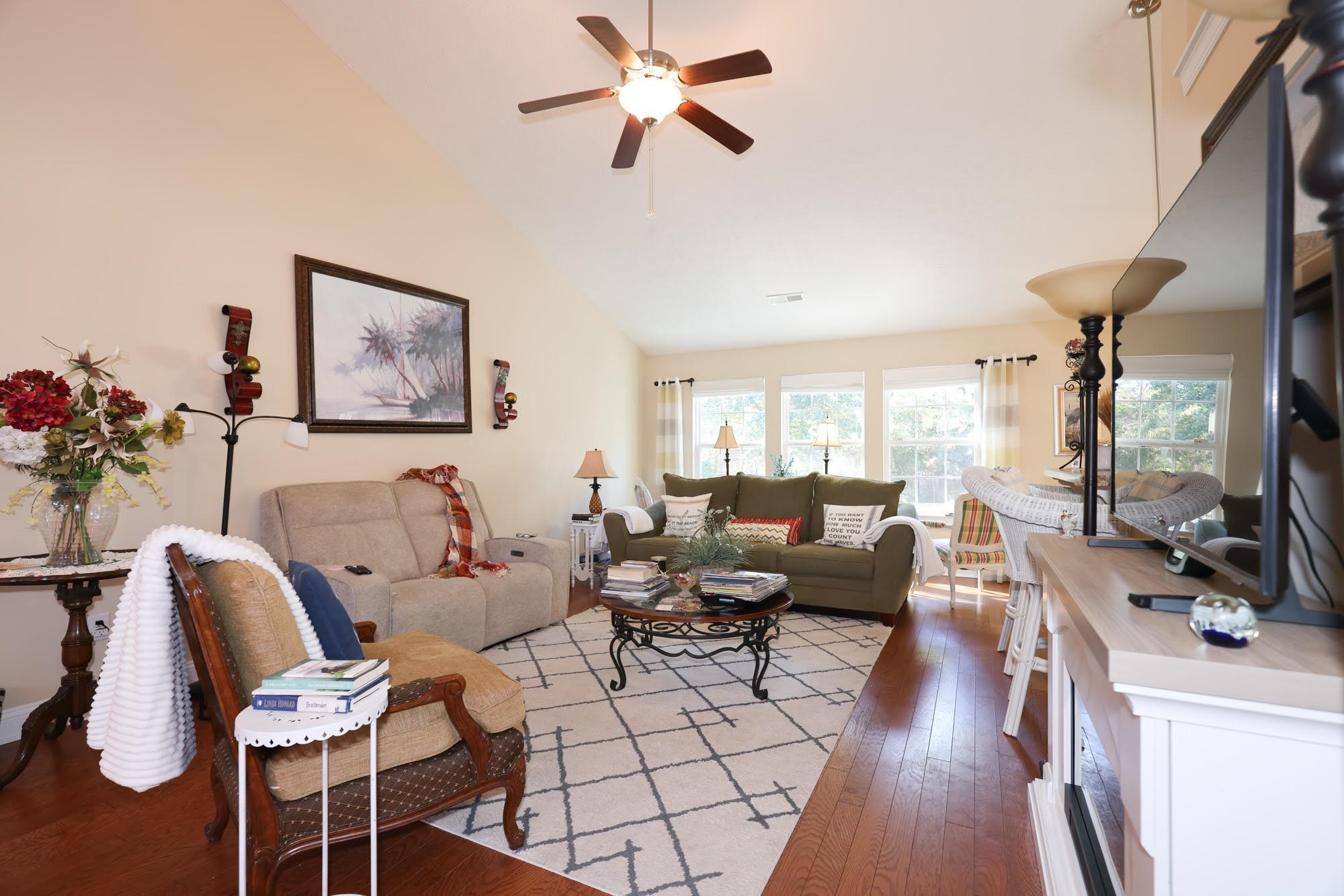 147 Quail Hollow Road Myrtle Beach, SC 29579 - Photo 2 of 35 Living room featuring hardwood / wood-style floors, high vaulted ceiling, and a ceiling fan