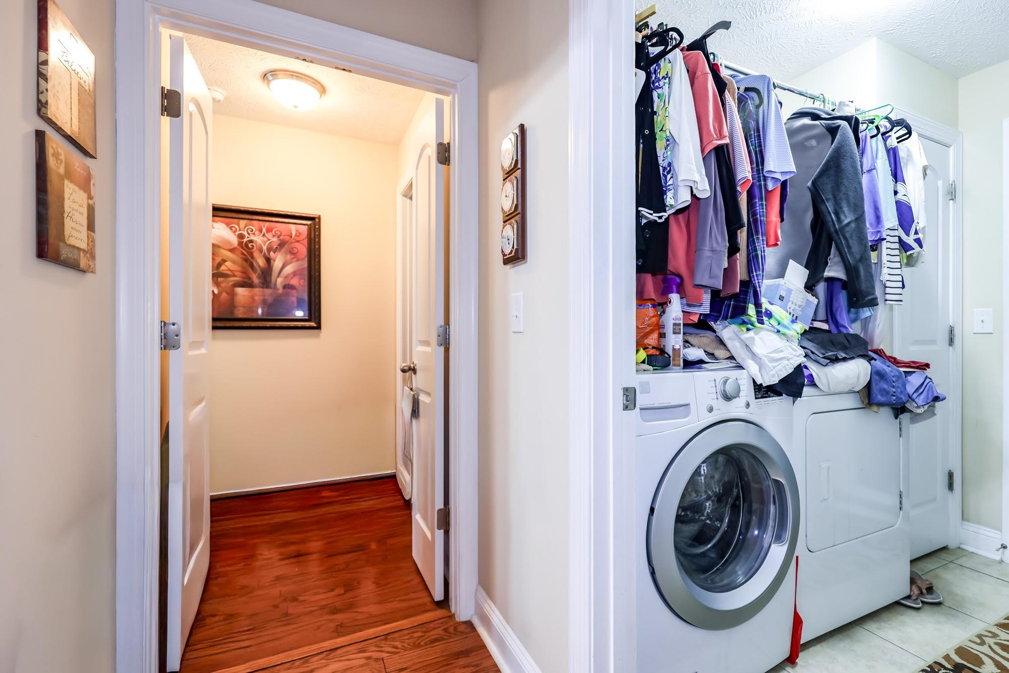 147 Quail Hollow Road Myrtle Beach, SC 29579 - Photo 24 of 35 Laundry area with separate washer and dryer and a textured ceiling