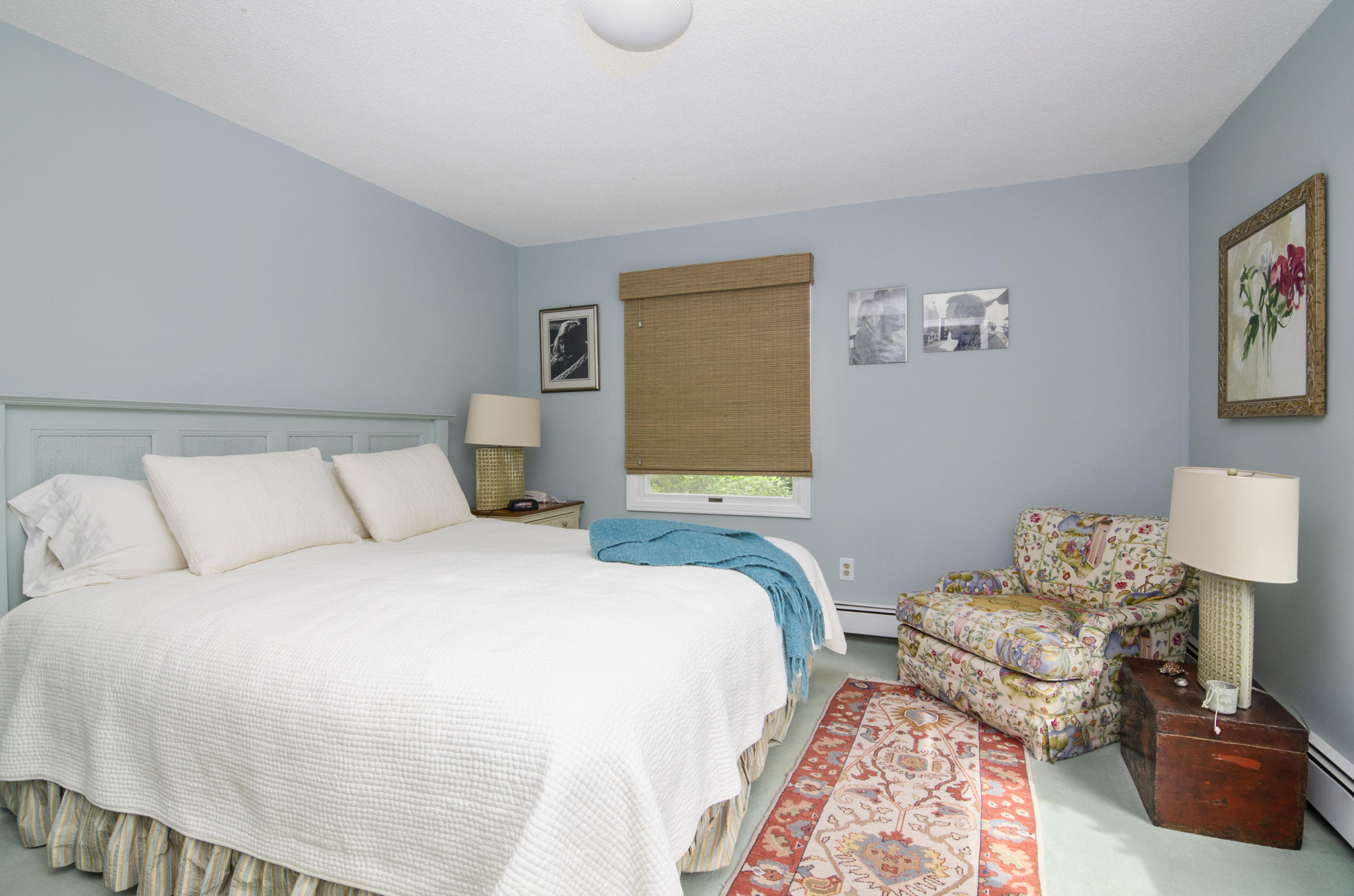 42 Round Cove Road Chatham, MA 02633 - Photo 13 of 26 a bedroom with a bed and a lamp