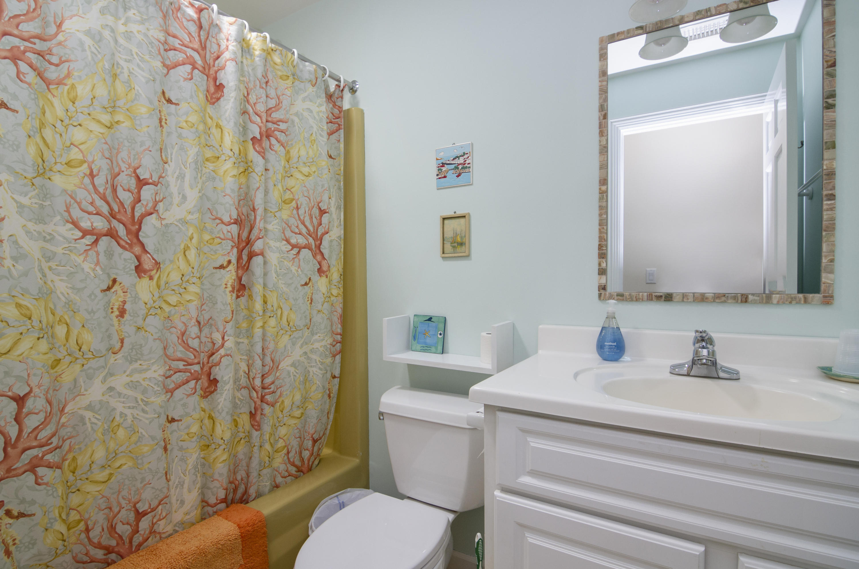 42 Round Cove Road Chatham, MA 02633 - Photo 19 of 26 a bathroom with a sink and a mirror