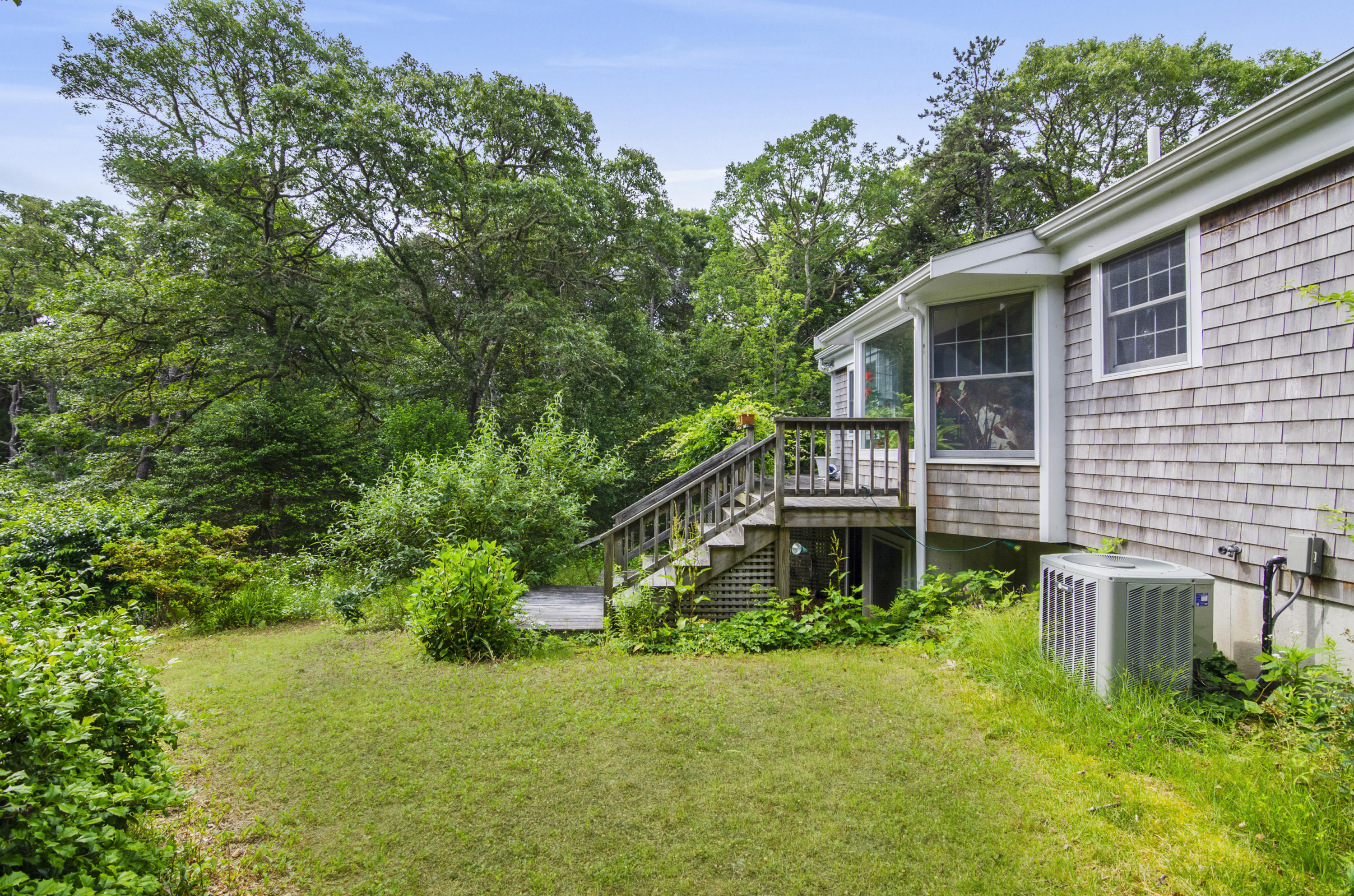 42 Round Cove Road Chatham, MA 02633 - Photo 22 of 26 a house view with a garden space