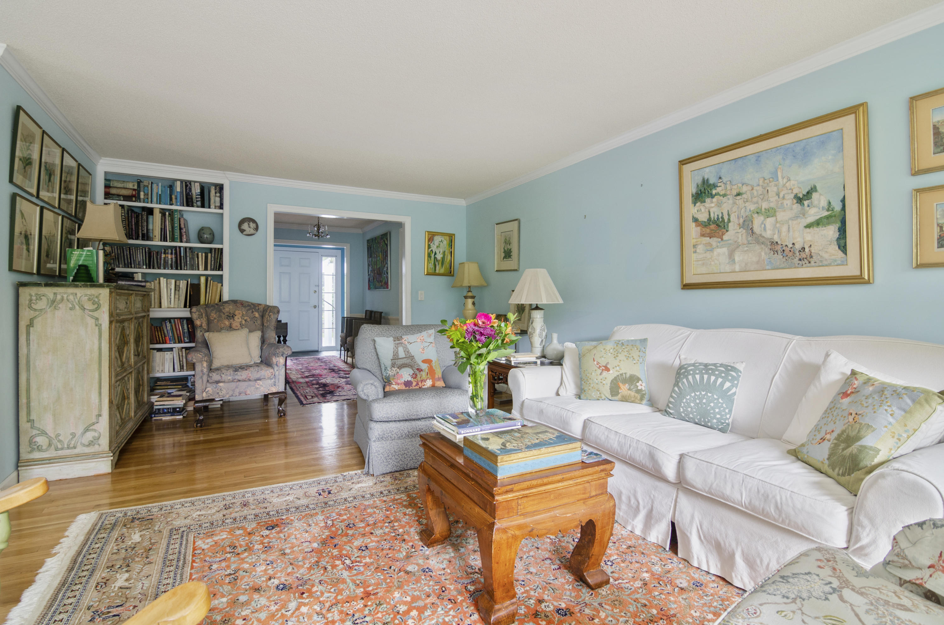 42 Round Cove Road Chatham, MA 02633 - Photo 5 of 26 a living room with furniture and a book shelf