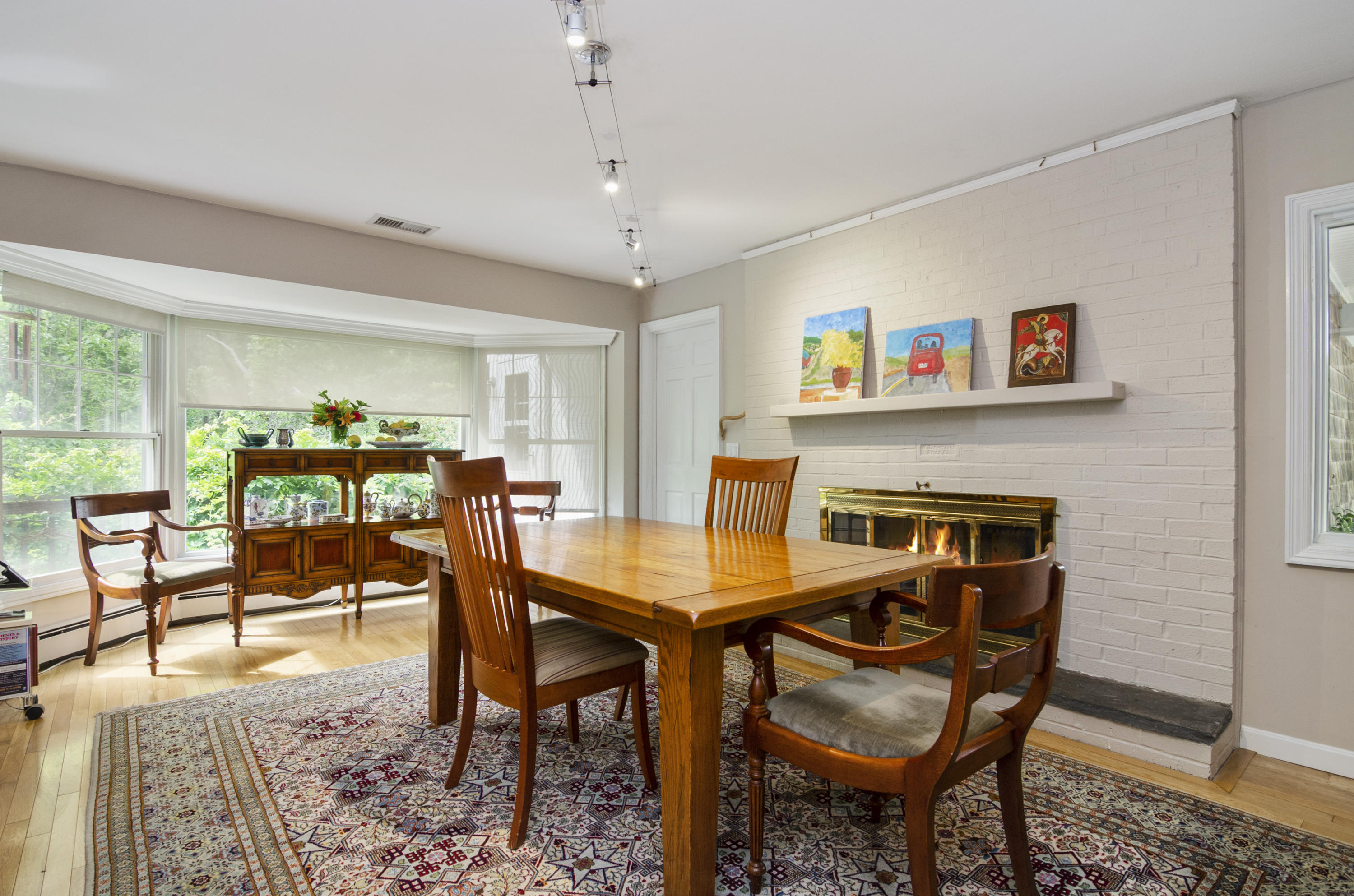42 Round Cove Road Chatham, MA 02633 - Photo 9 of 26 a dining room with furniture and a floor to ceiling window