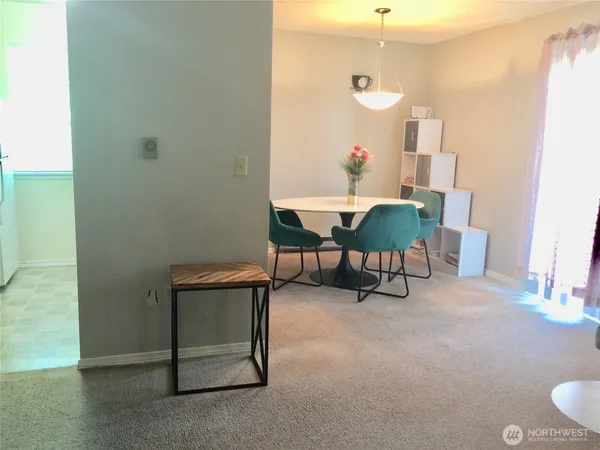a living room with furniture and a table