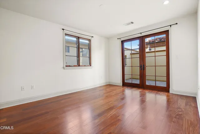 a view of an buildings from a balcony