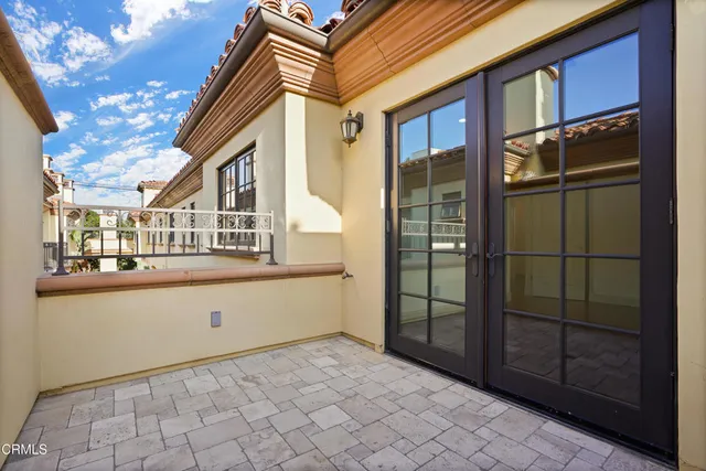 a view of an entryway with wooden floor and stairs
