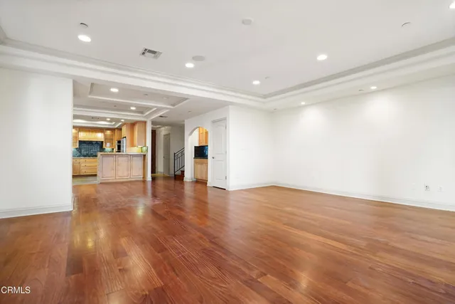 a view of a house with potted plants