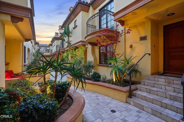 a view of a porch with a floor to ceiling window