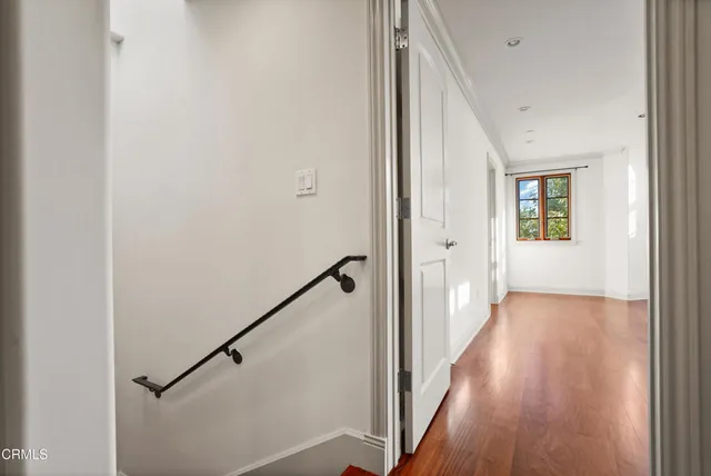 a bathroom with a bathtub and window