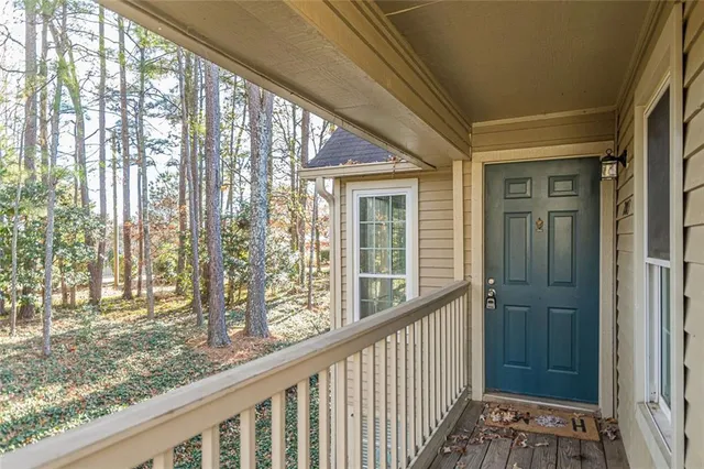a view of a porch with a yard