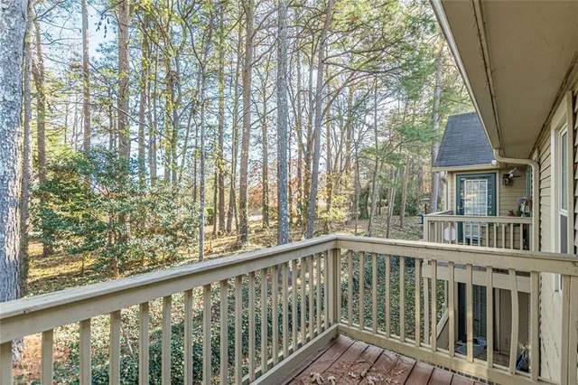 a view of a balcony with an outdoor space