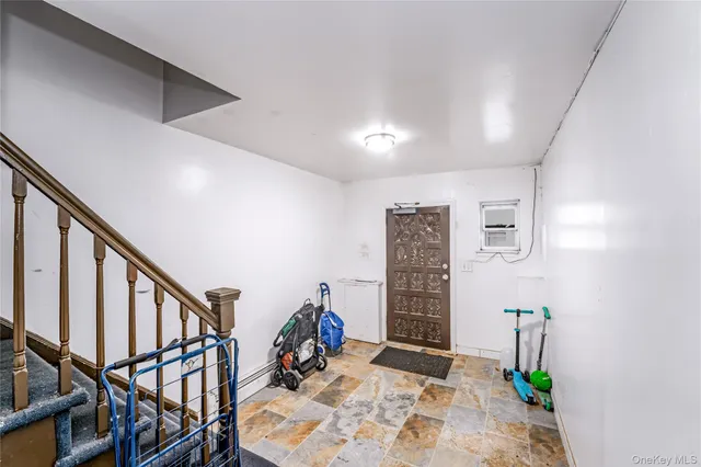 an outdoor sitting area with furniture