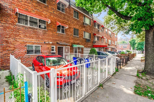 a view of street with small buildings