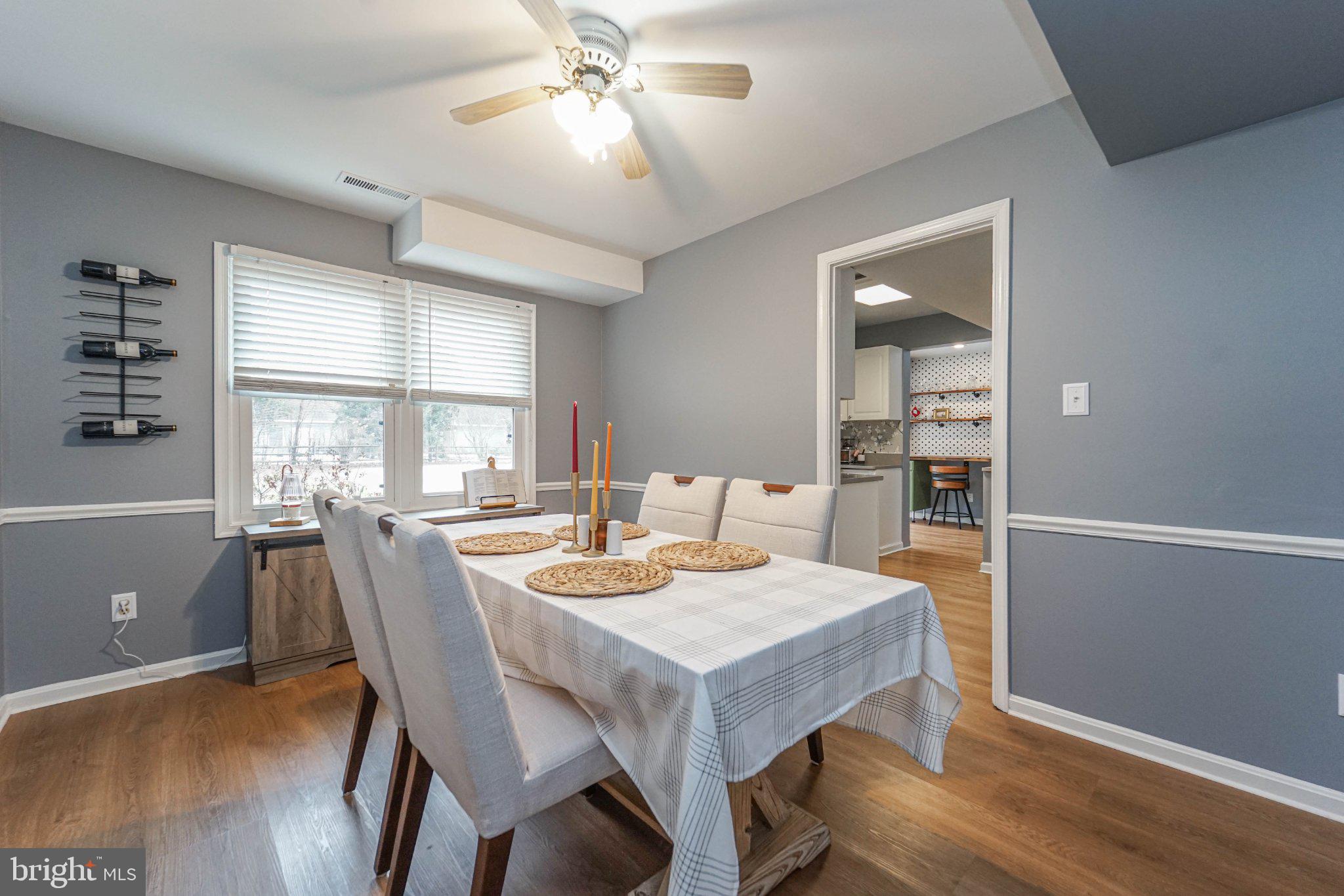 211 Queen Anne Road Stevensville, MD 21666 - Photo 14 of 33 Bright dining space with modern charm.