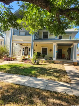 a view of a house with a swimming pool